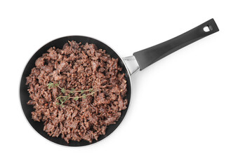 Fried ground meat and thyme in frying pan isolated on white, top view