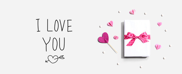 I love you message with a gift box and paper hearts