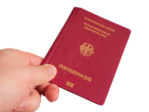 German Passport in Men's Hand, PNG Isolated