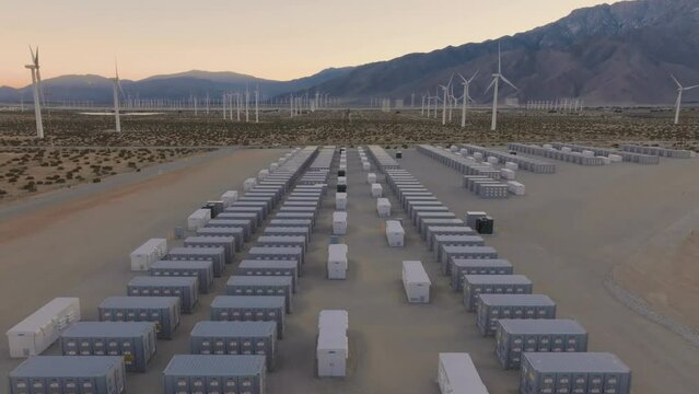 Aerial view of battery storage array at renewable wind turbine power farm in the Coachella Valley