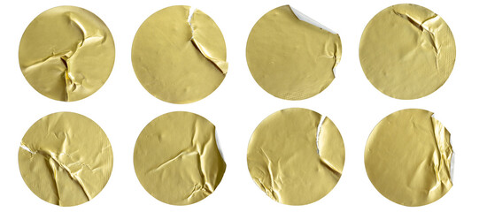 A set of blank gold round adhesive paper sticker label isolated on white background.	