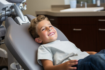 Kid smiling on dental chair