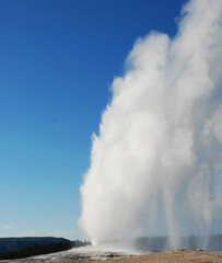 Spectacular panoramic views at Old Faithful Geyser in Yellowstone National Park, Wyoming Montana. Great hiking. Summer wonderland to watch wildlife and natural landscape. Geothermal.