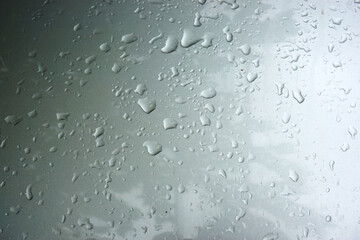 Background with drops of water on glass