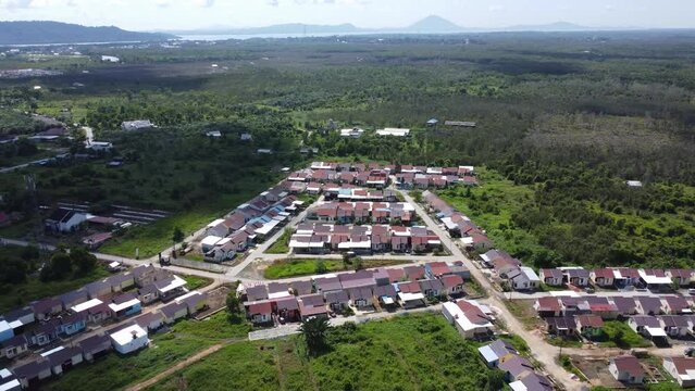 Aerial view of subsidized housing (KPR) on a wide and green land