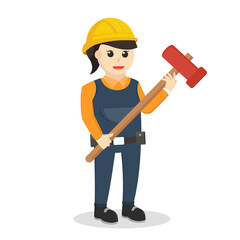 woman construction worker holding sledge hammer