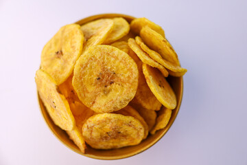 Kerala banana chips popular deep fried snack traditional South Indian tea time snack on banana leaf, Kerala India. made in coconut oil on Onam, Vishu, Diwali Deepawali, Ramzan, Eid India Sri lanka