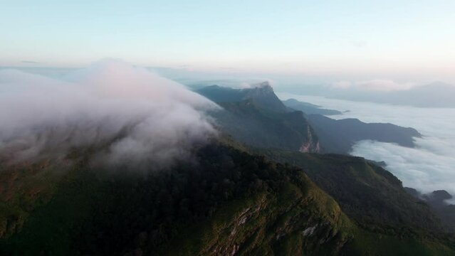 mountain ridge and clouds in rural jungle bush forest. Ban Phahee