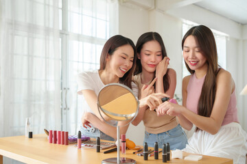 Asian Women applying body cream