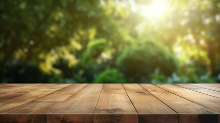 empty wood table top on blurred abstract green from garden