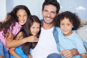 Smile, portrait and father with children on a sofa for relaxing, bonding or playing together at...