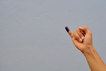 little finger after voting on Indonesia's presidential election - obrazy, fototapety, plakaty