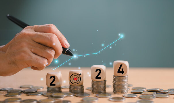 Happy new year 2024 money concept. Business target and goal trends 2024 calendar. Analysis strategy person planning business growth 2024 (end 2023), strategy digital marketing technology start up .
