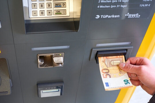 Closeup of cash machine. Pay with lots of money. Parking will be expensive in 2024.