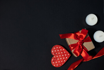 Valentine's Day. International Women's Day. Mothers day. Red hearts and craft gifts on a white wooden background. Copy space.