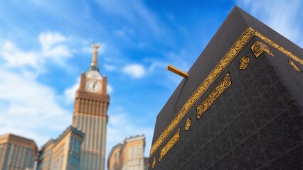 The Holy Kaaba is the center of Islam inside Masjid Al Haram in Mecca. Black silk cloth Kiswah with...