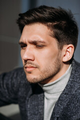 Obraz premium The image is a portrait of a man with a beard. 4785