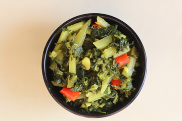Mustard greens and potato stir fry, leafy vegetable