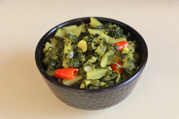 Mustard greens and potato stir fry, leafy vegetable