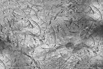 Black and white image of a metal surface.