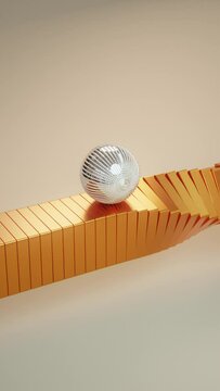 A metal ball rolling on a wooden ramp