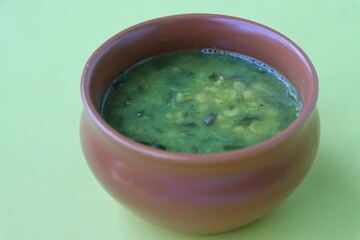 Palak Dal, Spinach Dal, Dal palak, a nutritious Indian curry with spinach, lentils, spices and herbs, served with roti or rice - obrazy, fototapety, plakaty
