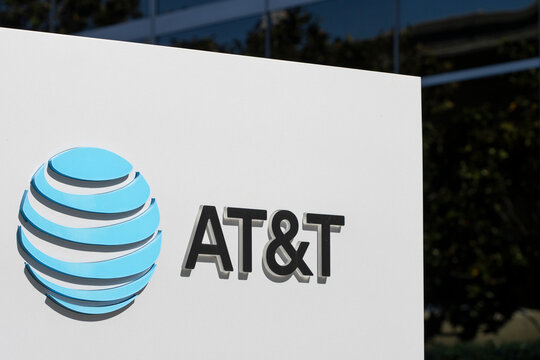 El Segundo, CA, USA - May 10, 2022: Closeup of the ATT sign seen at the DirecTV headquarters in El Segundo, California. AT and T Inc. is an American multinational telecommunications holding company.