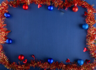Blue Christmas background with colorful balls and red ribbon - 703703854
