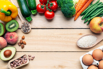 Healthy food background with various vegetable ingredients, fruits, vegetables, eggs, legumes,...