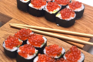 sushi with chopsticks