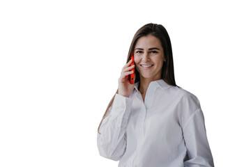 Cheerful brunette hispanic young businesswoman talking by phone against transparent background, great news. Pretty caucasian girl  using cell phone looks happily at camera. Successful female.
