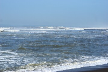 waves crashing on the beach