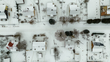 Drone photography of small rural village during winter cloudy day