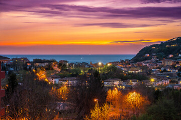 Fototapeta na wymiar Sunset in Donostia San Sebastian from the Intxaurrondo neighborhood and the sea in the background. Basque Country