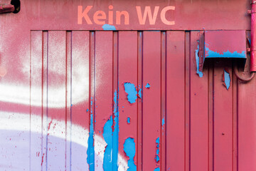 A notice on a wall that this is not a wc writen in german language - 703714088