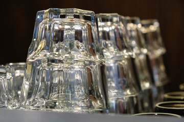 Empty upside down clear glass pattern texture on top of rack. Serving. party. wedding. Cafe. Leisure
