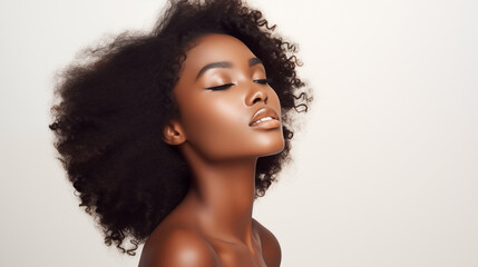 Beautiful young black woman with glowing healthy skin close-up. Advertising of cosmetics, perfumes, copy space - obrazy, fototapety, plakaty