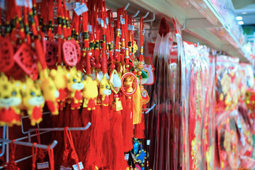 Colourful ornamental decorations for sale in shop before the festive Lunar New Year. Selective focus