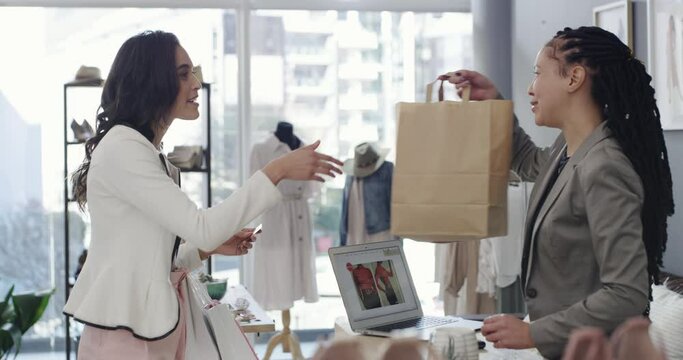 Payment, woman or happy customer with credit card in boutique at checkout transaction on electronic pos. Shopping, people or client paying to purchase at fashion store for retail sale or discount