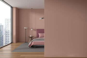 Beige and red bedroom interior with blank wall