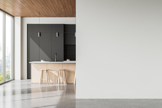 Stylish kitchen interior with bar island and cabinet near window. Mock up wall