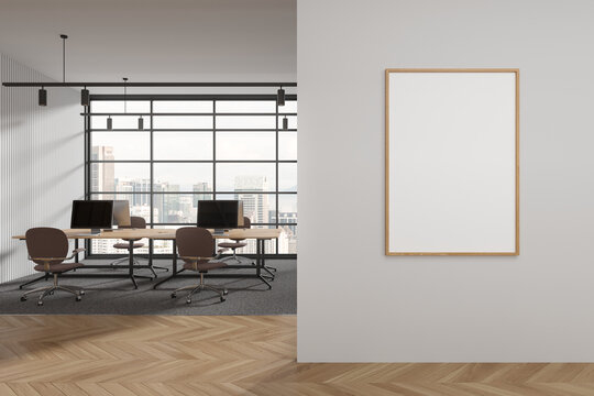 White open space office interior with poster