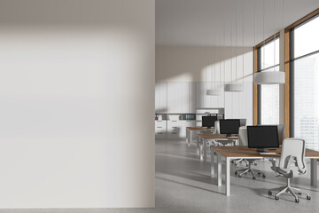 Stylish white office with blank wall
