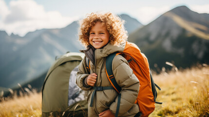 Child traveling with camping tent gear. Active family vacations. Kid hiking adventure trip exploring mountains - obrazy, fototapety, plakaty