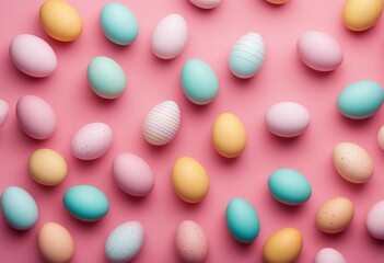 Pastel Easter eggs on pink background top view Flat lay style