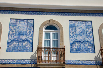 Aveiro beautiful facade decorated with blue tiles - 703755456