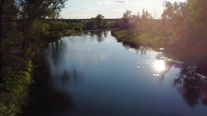 blue lake on a summer evening at sunset