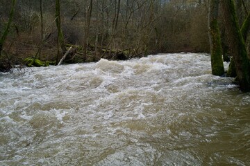 water flowing over the river
