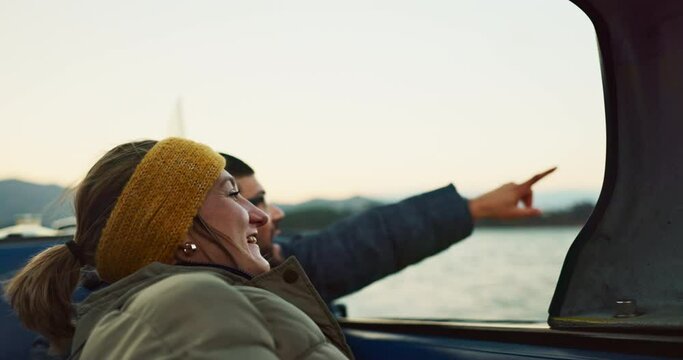 Happy, love and young couple on a boat for exploring on vacation, weekend trip or holiday. Smile, romantic and man and woman on a vessel for valentines day date on adventure together by ocean or sea.