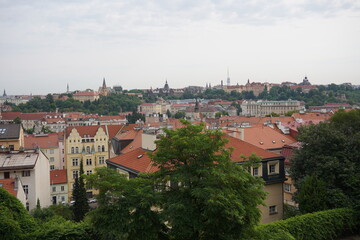 Fototapeta na wymiar Scenic view of the red rooftops of the old houses in Prague, Czech Republic
